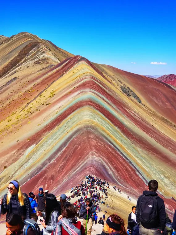 Striped Rainbow Mountain with hikers on the trail